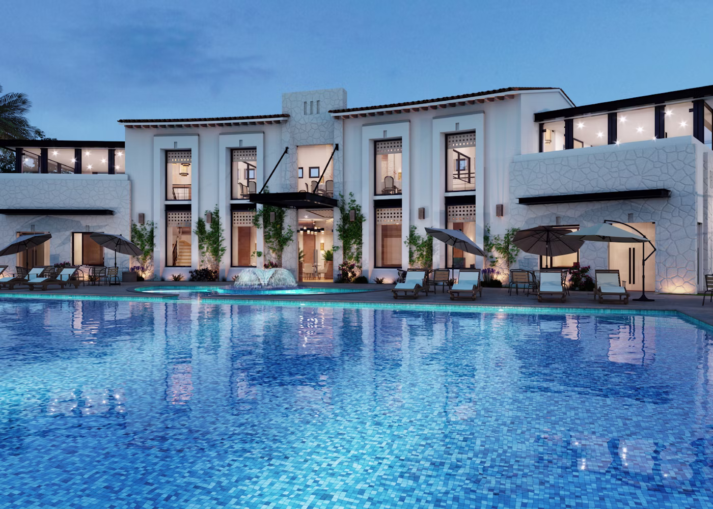 The Velvet Crest City Centre branch exterior with a landscaped pool courtyard