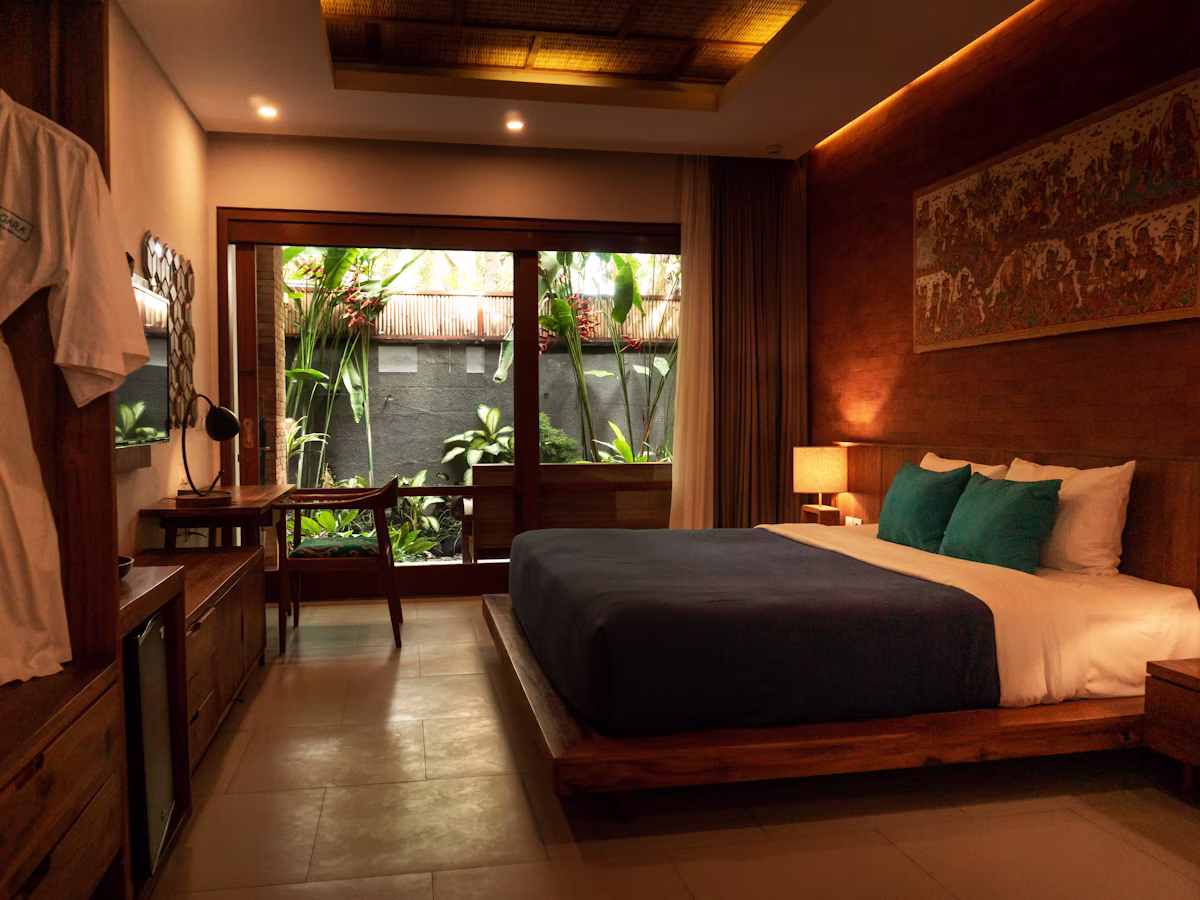 Cosy suite interior with a writing desk and golden evening light