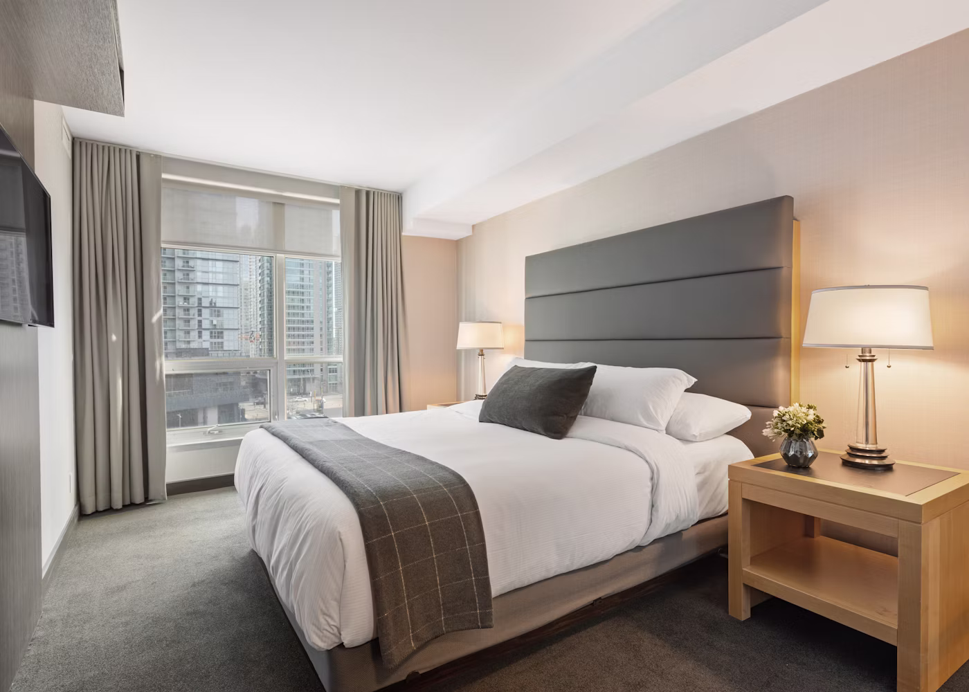 The Velvet Crest Kingsize NON AC room with a plush kingsize bed and warm natural light